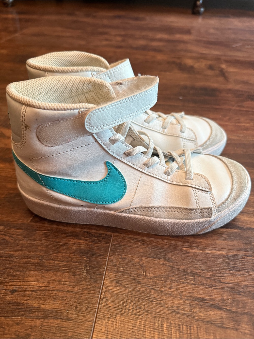 Nike Kids High-Top Sneakers in White with Teal Swoosh